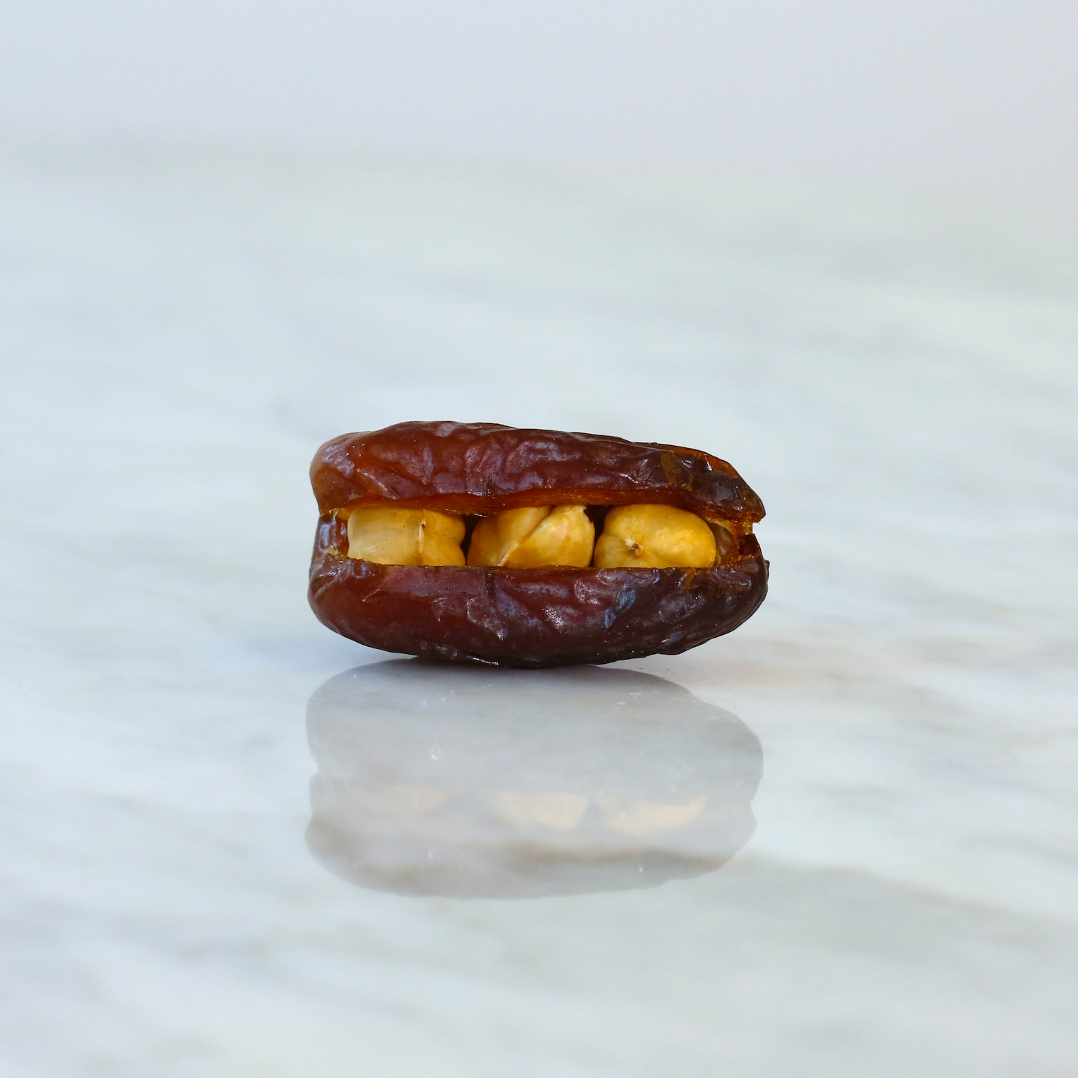 Raw Dates filled with Hazelnut (Anbari)